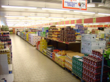 UK shop prices fall for first time since March as retailers slash food costs