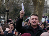 Jailing of UK far-right figure Tommy Robinson triggers clashing protests in London